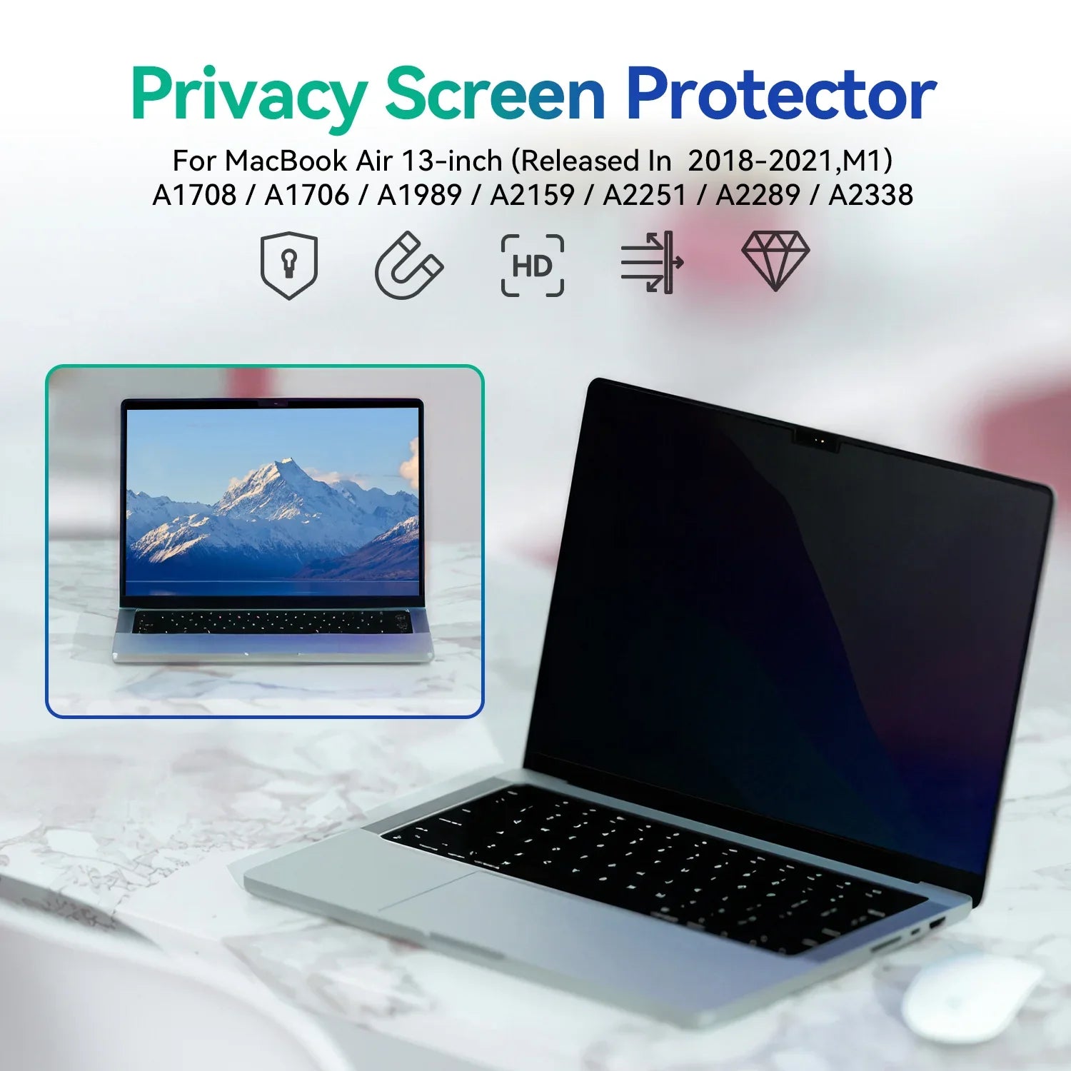 MacBook Air 13-inch with privacy screen protector blocking side views on marble desk