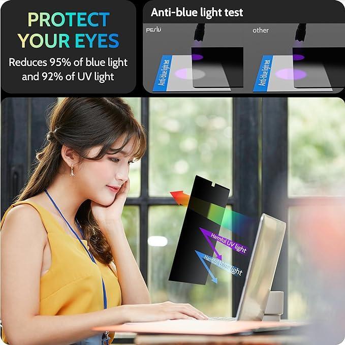 Young woman using laptop with magnetic privacy screen blocking harmful blue and UV light indoors